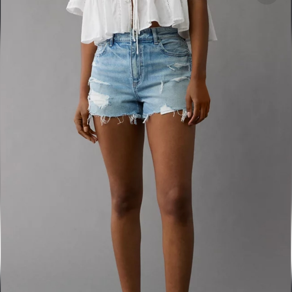 American Eagle | High Waist Light Washed Denim Next Level Ripped Shorts